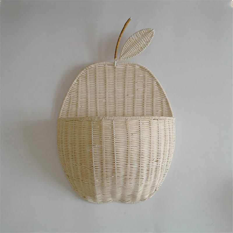Apple shaped rattan wall baskets in brown and white with plush toys