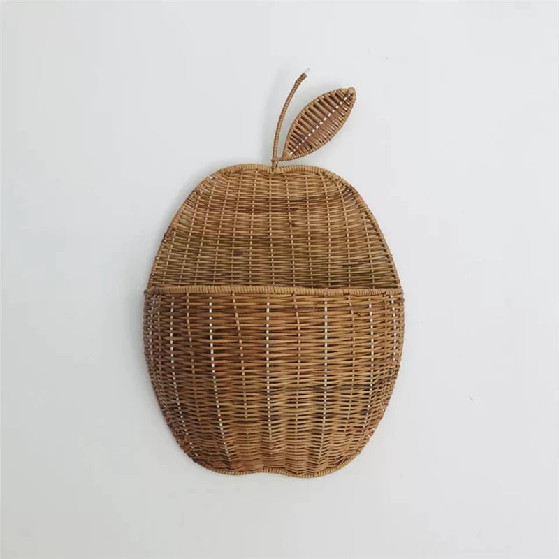 Apple shaped rattan wall baskets in brown and white with plush toys