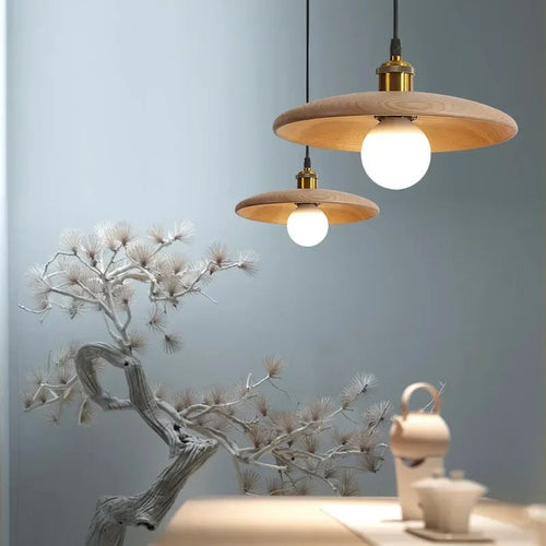 Round pendant light with arched natural wood and bamboo ribs