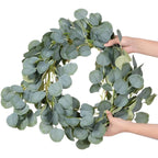 Artificial eucalyptus garland with sage green leaves and small white flowers