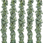 Artificial eucalyptus garland with sage green leaves and small white flowers