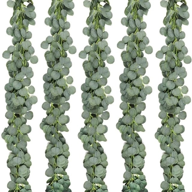 Artificial eucalyptus garland with sage green leaves and small white flowers