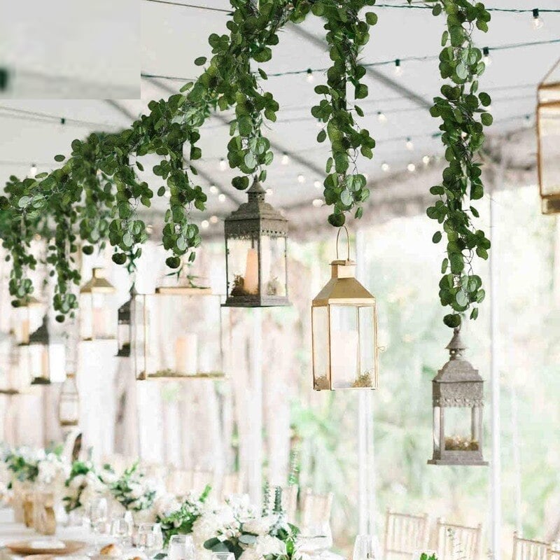 Artificial eucalyptus garland with sage green leaves and small white flowers