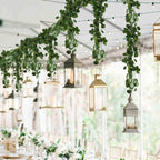 Artificial eucalyptus garland with sage green leaves and small white flowers