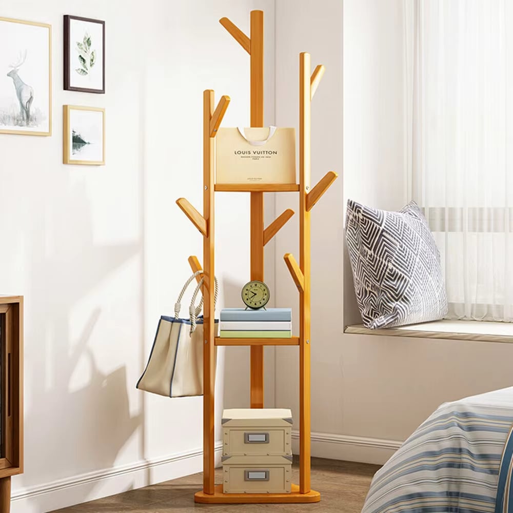 Tall freestanding bamboo coat stand on a three legged base
