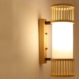 Slim cylinder wall sconce with bamboo slats and a white diffuser