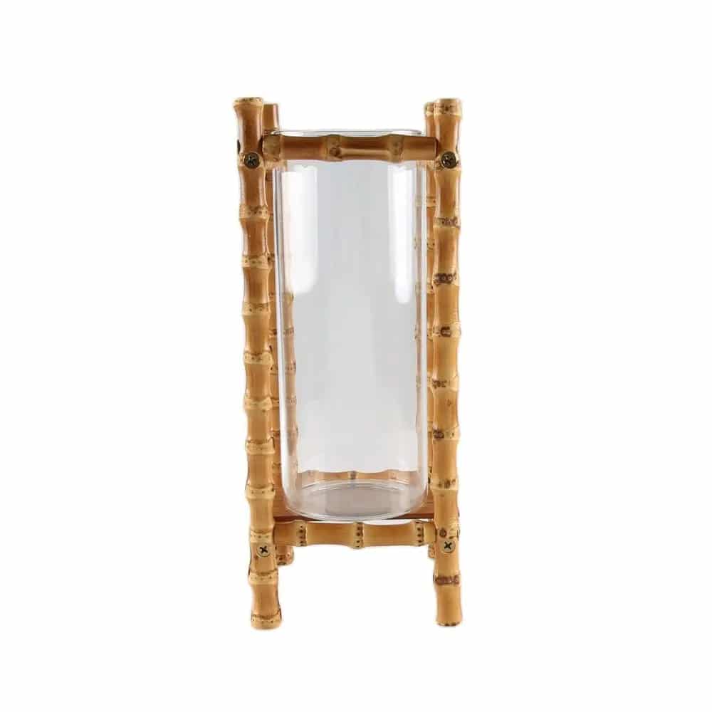 Glass cylinder held in a four post bamboo frame