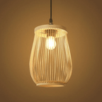 Handwoven bamboo lantern pendant light glowing warm