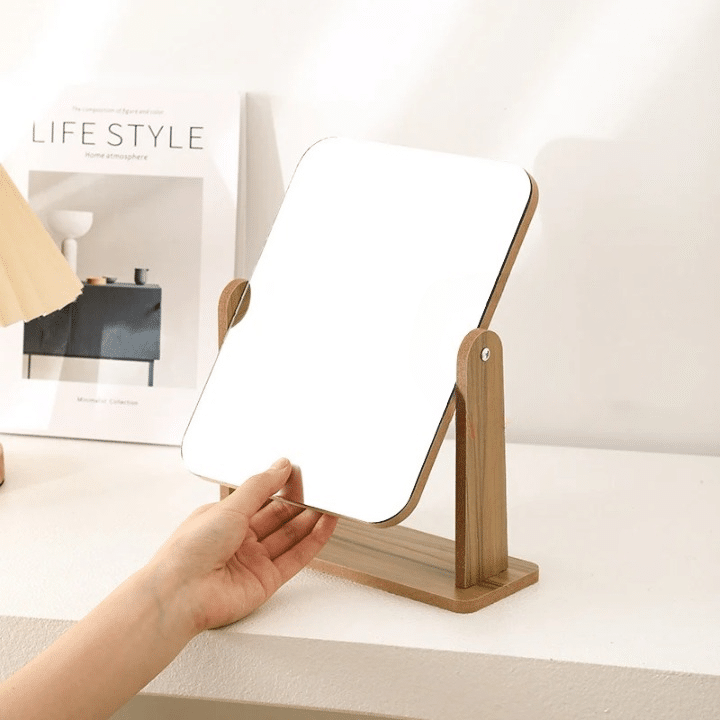 Rectangular bamboo vanity mirror tilting on a tray base