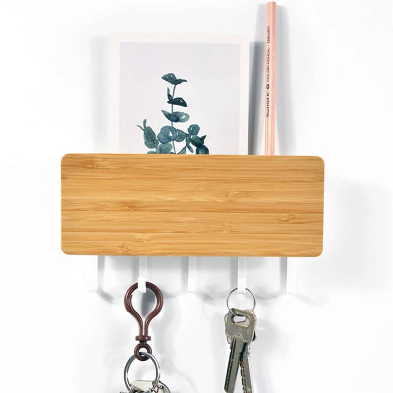 Bamboo wall key holder with a small shelf and five white hooks