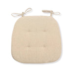 Beige thin polyester seat cushion with ties for a rattan chair