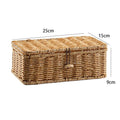 Stacked beige lidded woven storage boxes