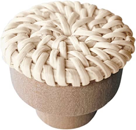 Round beige furniture knob with rattan woven around a wooden core