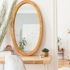 Round beige furniture knob with rattan woven around a wooden core