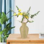 Beige woven bamboo vase with curved body and flared neck