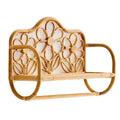Rattan wall shelf shaped like a small bench with flower back