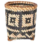Cylinder bamboo wastebasket with black geometric woven patterns