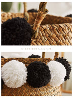 Black and natural belly basket with black and white pom poms