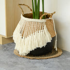 Black and natural belly basket with a fringe of white tassels