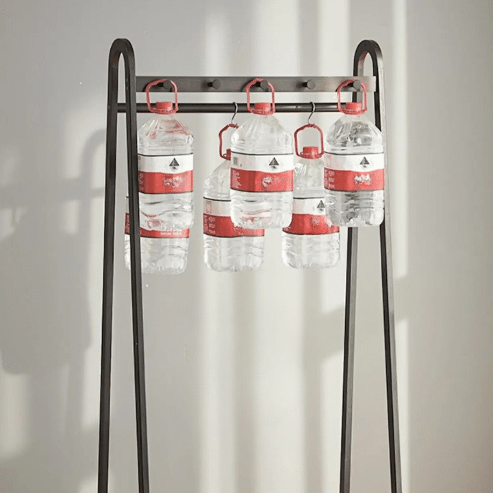 Tall black bamboo clothes rack with clean Asian inspired lines