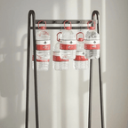 Tall black bamboo clothes rack with clean Asian inspired lines