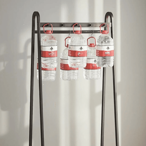 Tall black bamboo clothes rack with clean Asian inspired lines
