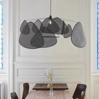 Large black hand woven rattan pendant light with leaf shaped arms