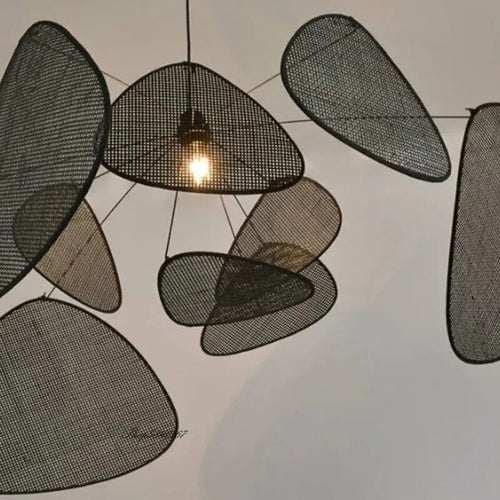 Large black hand woven rattan pendant light with leaf shaped arms