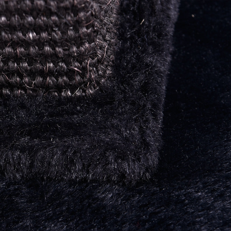 Tall black scratching post with plush top perch, pompom toy and square base