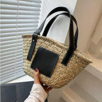 Black hand woven raffia straw handbag with two short handles