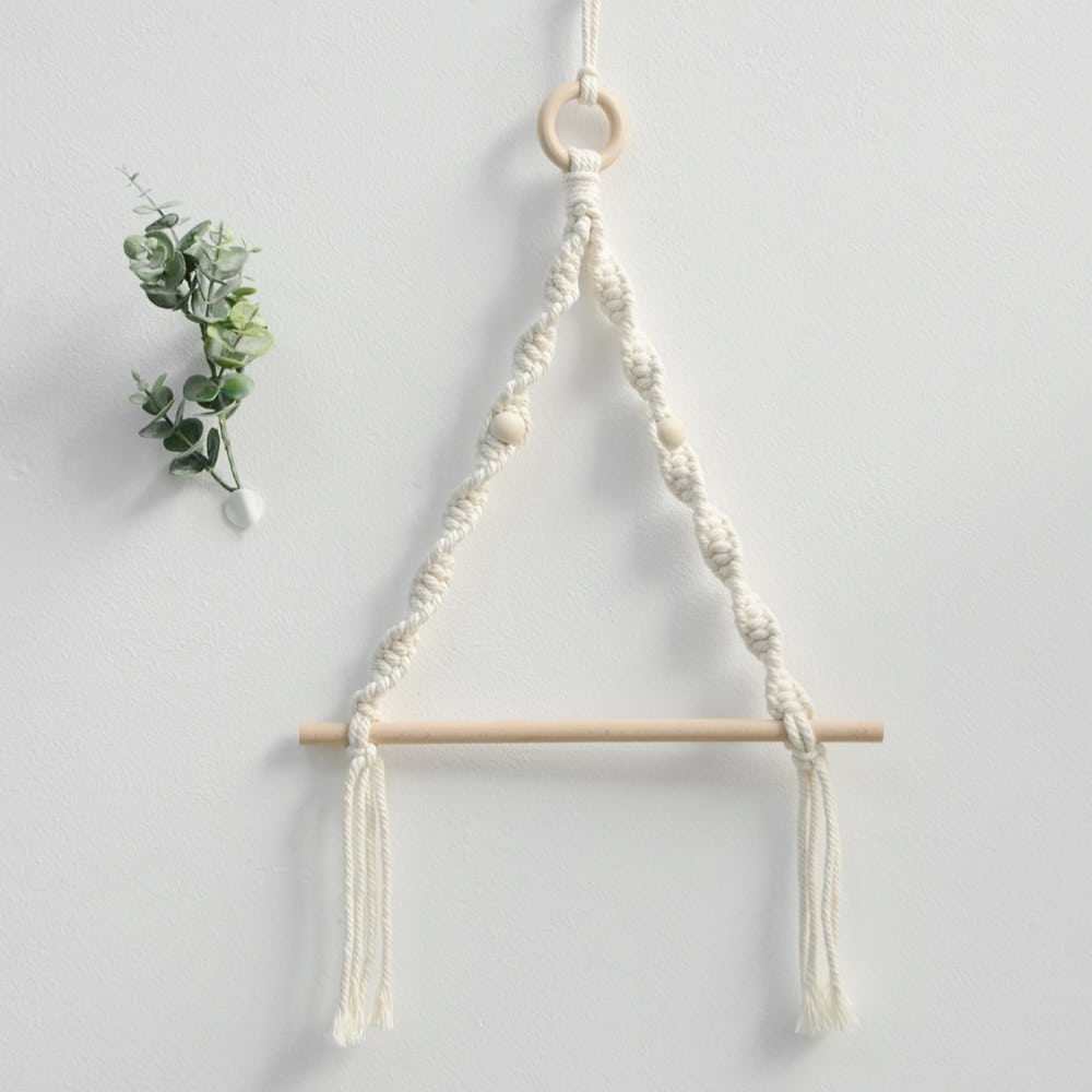 Round boho wall hoop in wood with a hand woven fiber center