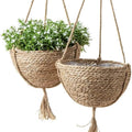 Round boho hanging planter hand woven in natural rattan