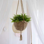 Round boho hanging planter hand woven in natural rattan