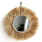 Round straw fringe mirror with a ring of wooden beads