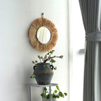 Round straw fringe mirror with a ring of wooden beads