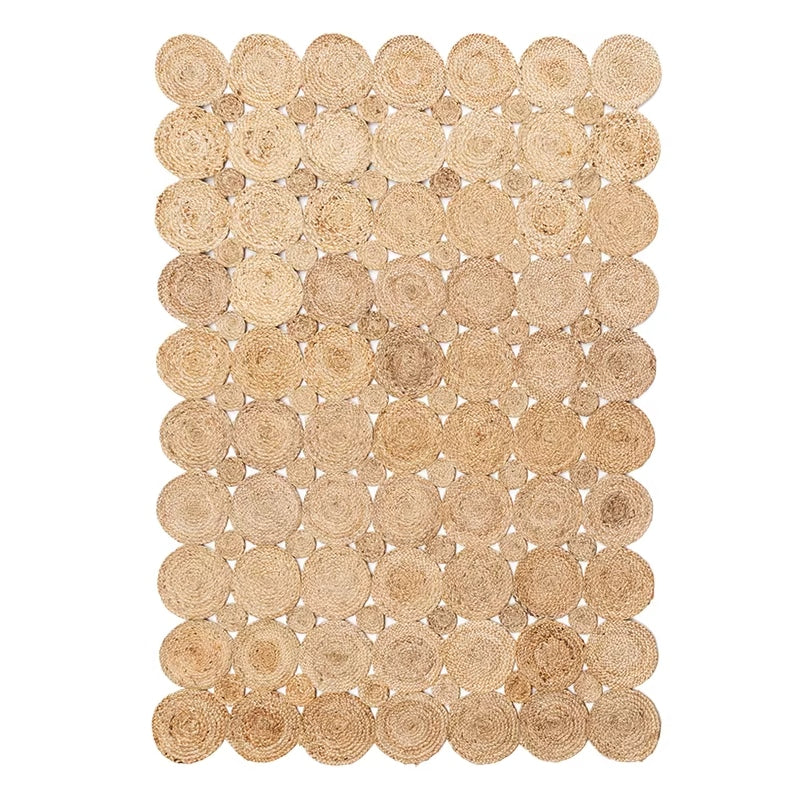 Rectangular jute rug made of braided circles