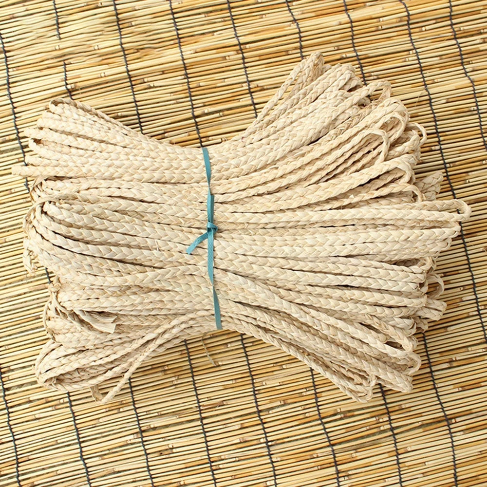 Bundle of flat braided natural rattan craft cord