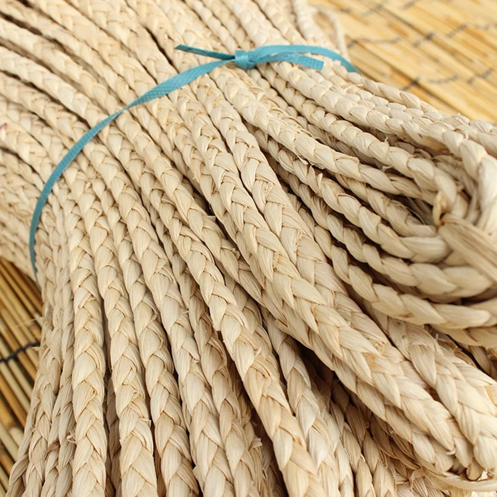 Bundle of flat braided natural rattan craft cord