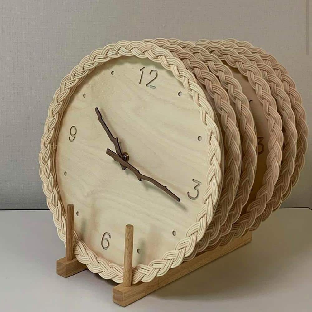 Round wall clock with a braided rattan rim and beige dial