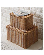 Stacked brown lidded woven storage boxes
