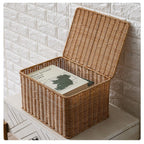 Stacked brown lidded woven storage boxes