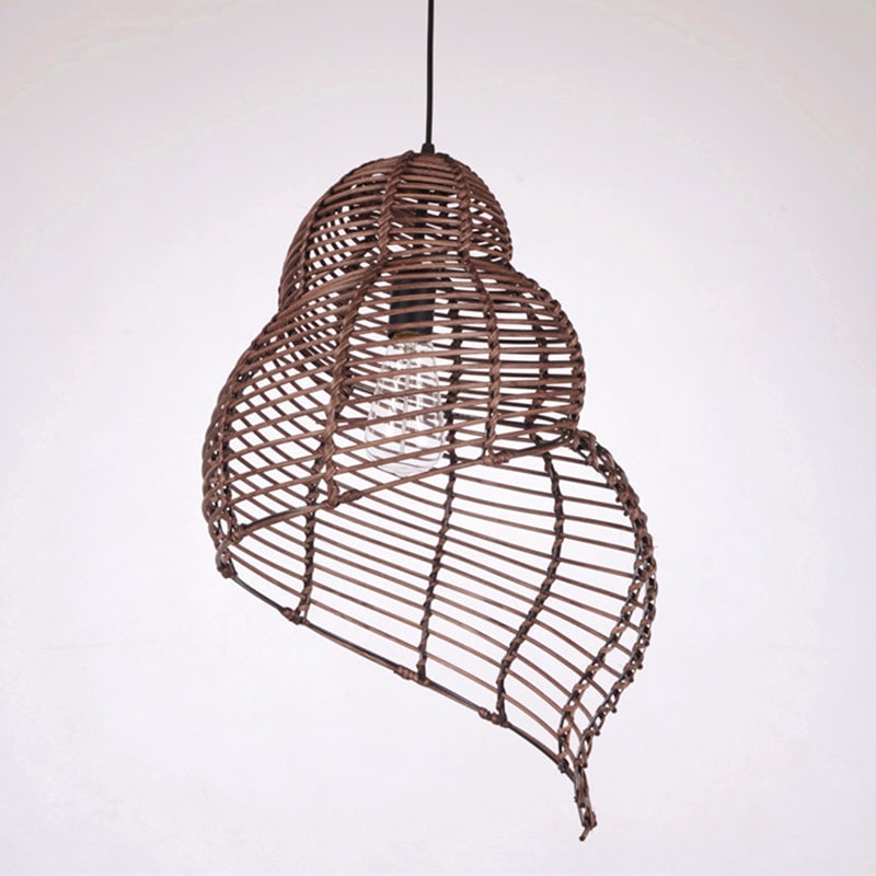 Brown open weave rattan pendant shaped like a conch seashell