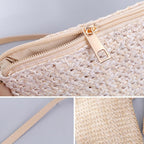 Compact brown woven straw and rattan crossbody bag with an adjustable strap