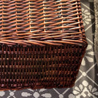 Brown wicker laundry hamper with lid and fabric liner
