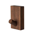 Small brown wood wall hook with visible grain