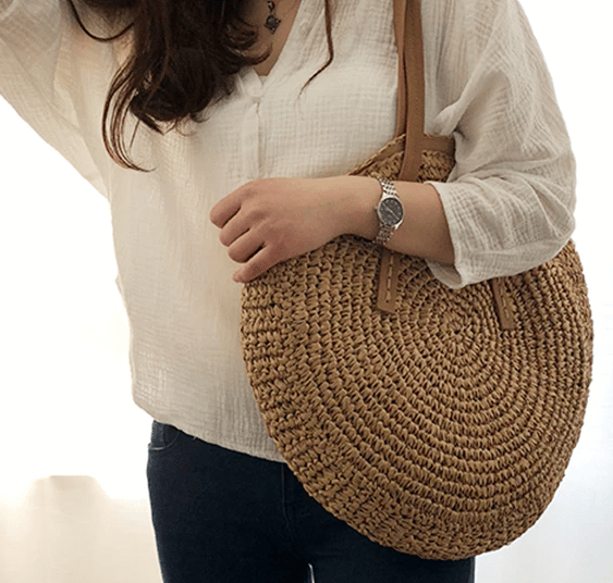 Roomy brown hand woven beach bag with sturdy handles