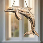Carved wooden dolphin wall decor