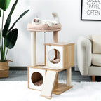 Wood look cat tree with two cube condos, scratching ramp and round pink plush perch