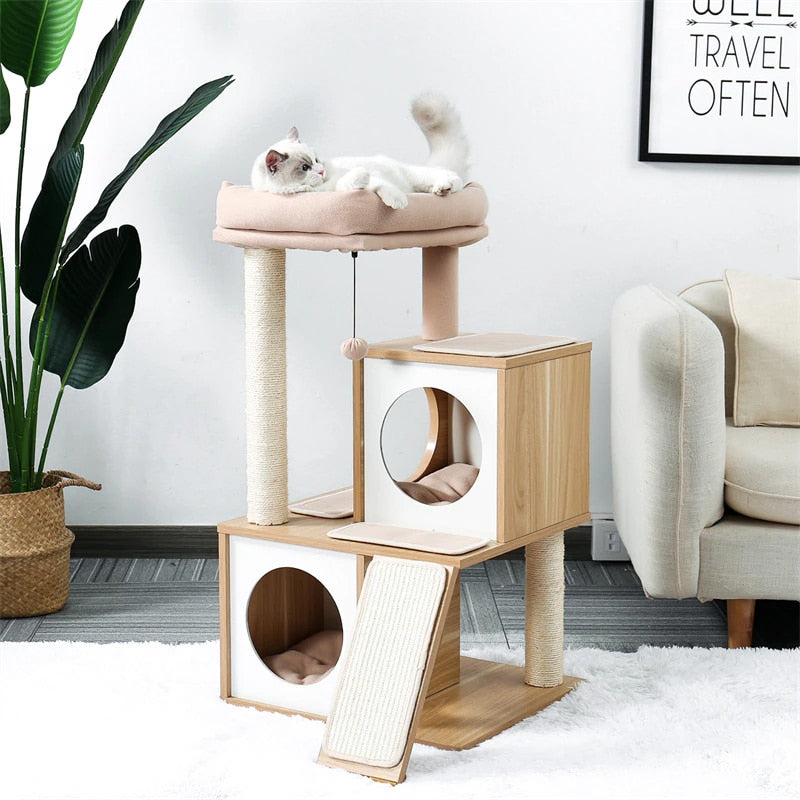 Wood look cat tree with two cube condos, scratching ramp and round pink plush perch