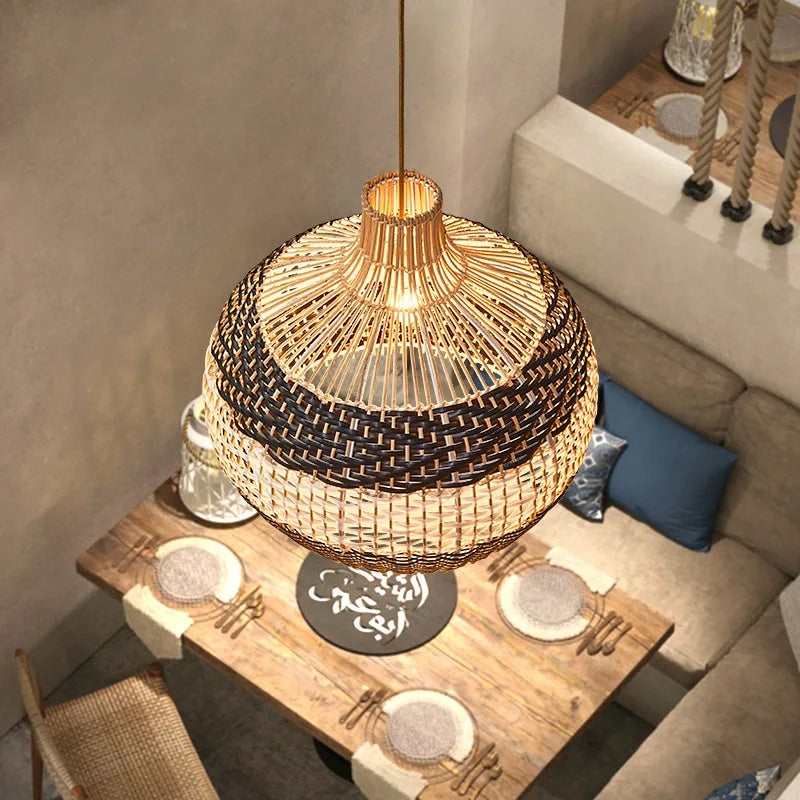 Chic rounded pendant light hand woven in white or black wicker